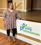 GNTC STUDENT CLIMBING CORPORATE LADDER WITH AREA BANK
