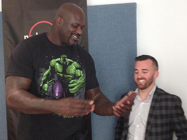 Shaquille O'Neal and Austin Dillon Check out the new iPhone.