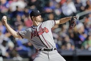 FILE- Atlanta Braves starting pitcher Mike Soroka winds up during the first inning of a baseball game against the New York Mets, Sunday, Sept. 29, 2019, in New York. (AP Photo/Kathy Willens)