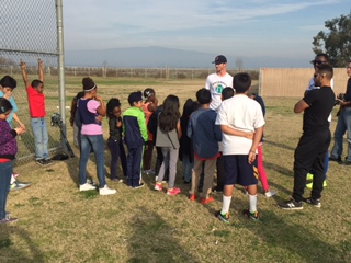 PRO PLAYER HELPS BAKO KIDS LEARN BASEBALL