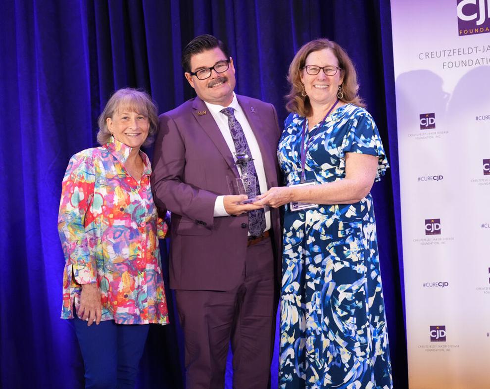corum honored for volunteer work regarding rare brain disease