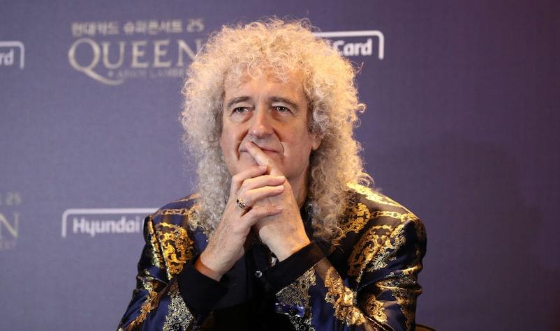 Queen’s Brian May Has an Altercation with a Persistent Reporter