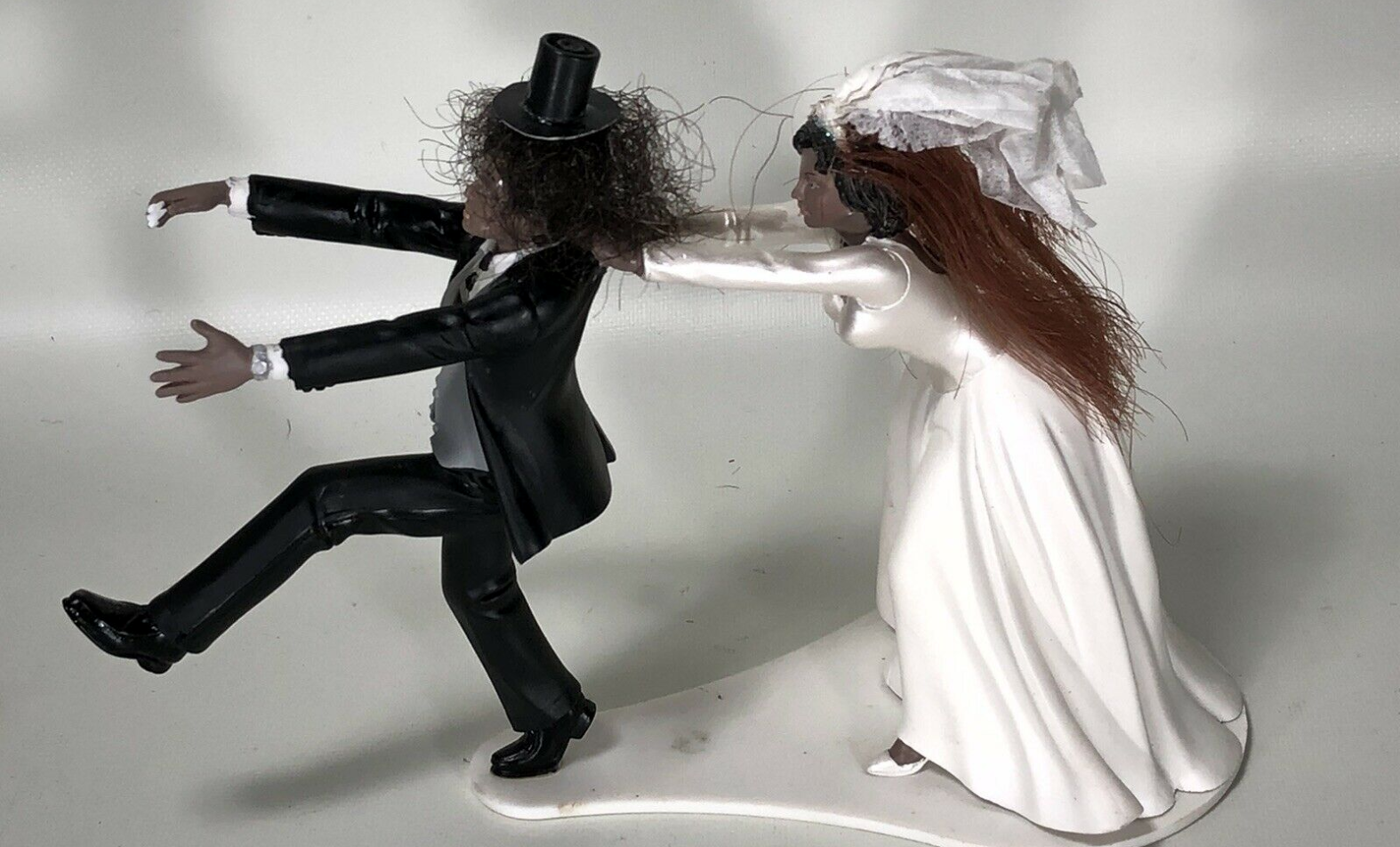 Slash’s Wedding Cake Topper Reportedly For Sale on Ebay