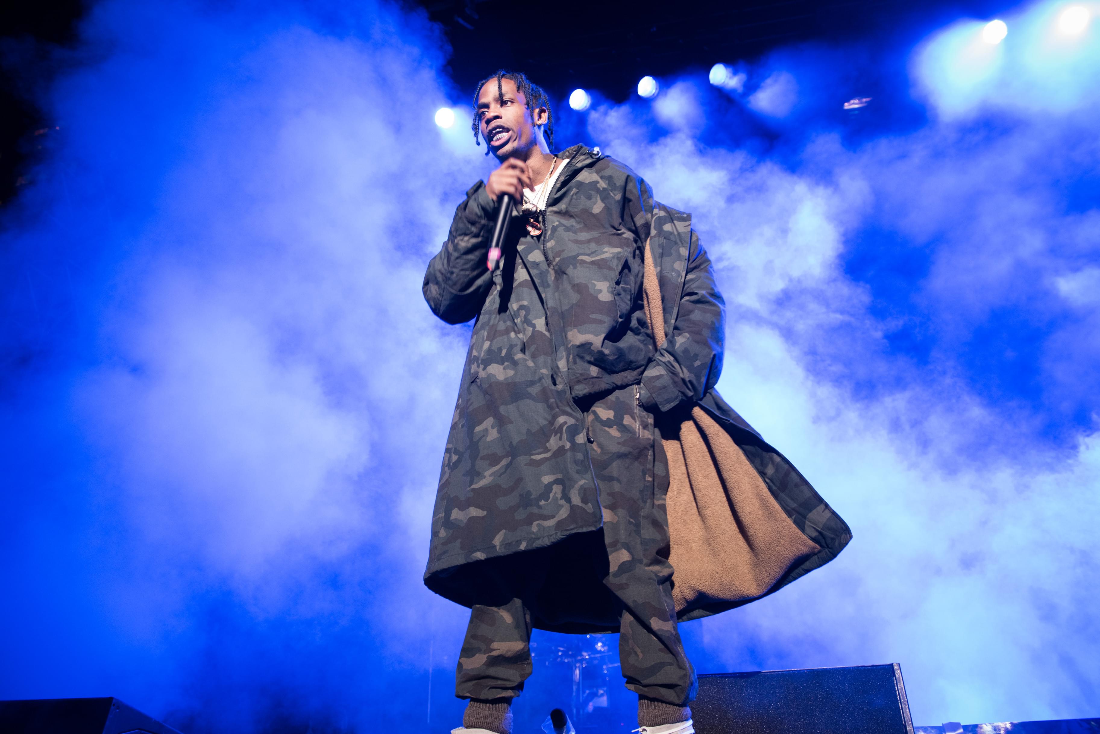 Travis Scott Fell Off Stage While Performing With Drake [WATCH]