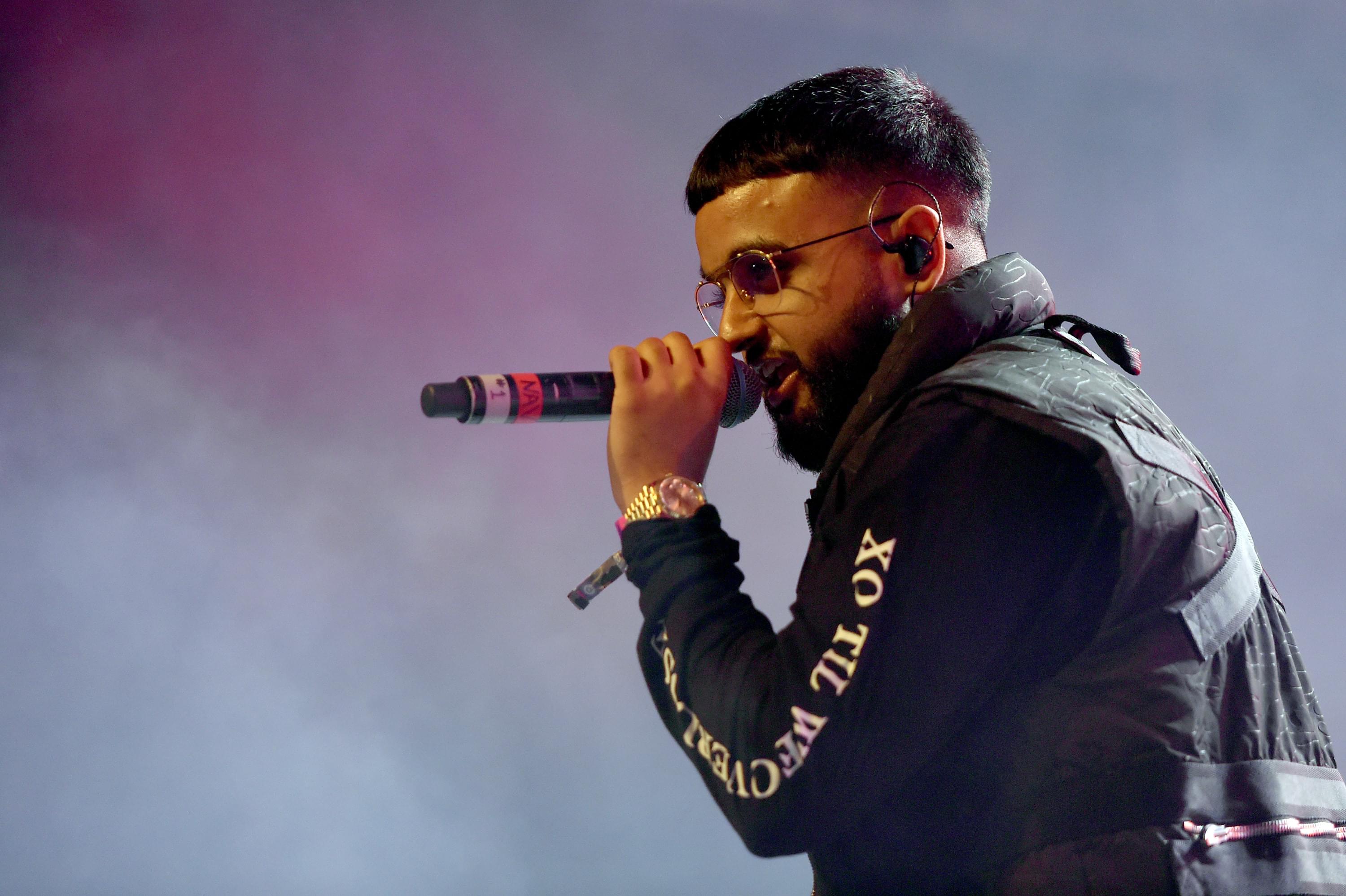 NAV & Travis Scott Take You On Vacation In Music Video For “Champion” [WATCH]