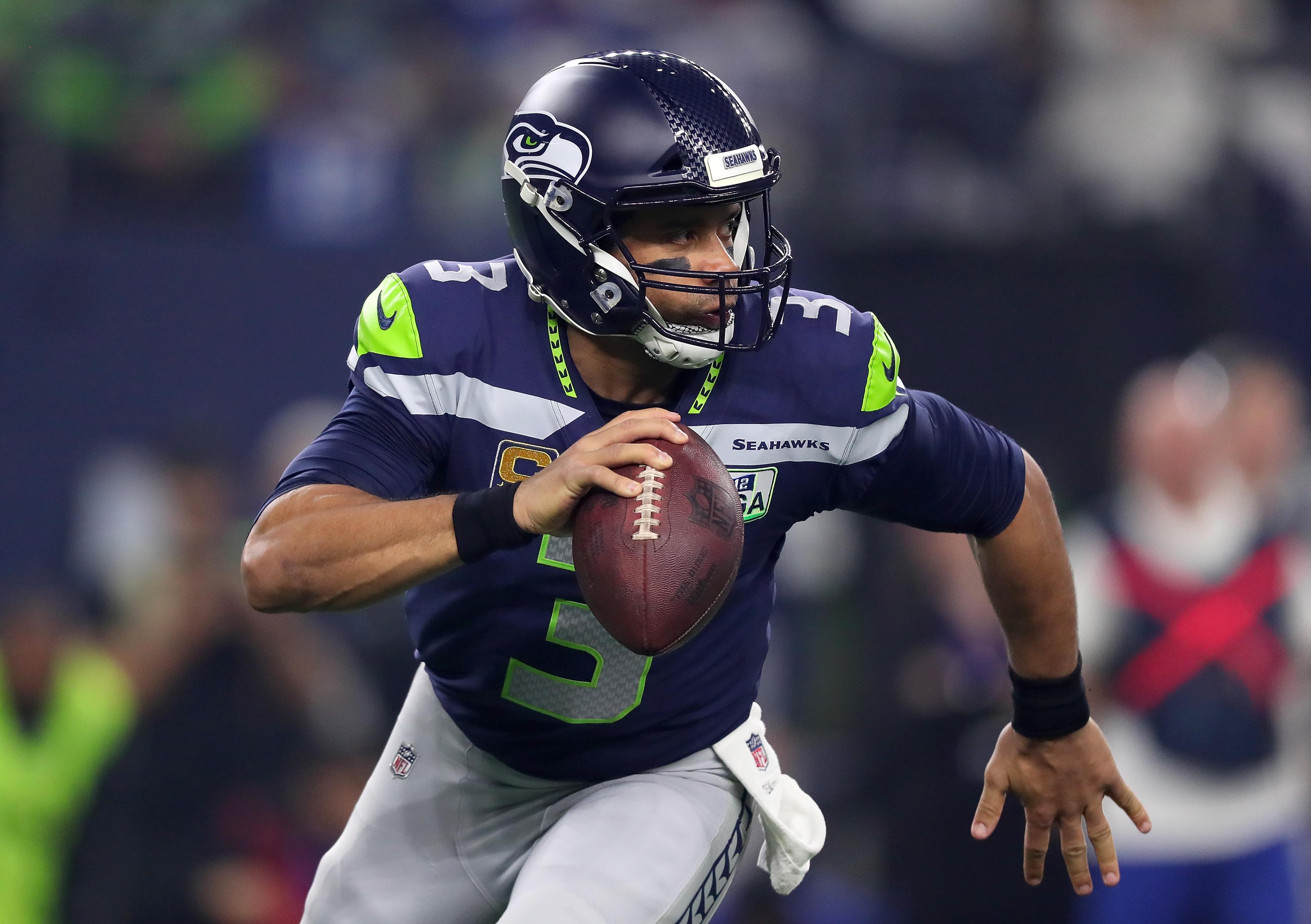 Russell Wilson Gifts His Linemen Stock In Amazon