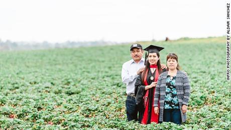 Student Honors Parents With Grad Photos In Fruit Fields Where They Work