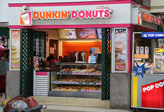 Doughnut Eating Champ Charged with Stealing from Dunkin’ Donuts