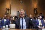 Kennedy tries to defend COVID-19 vaccine stance in raucous Senate hearing