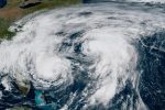 Bermuda lashed by distant hurricane and prepares for the stronger Imelda