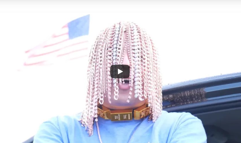 Ouch! Rapper gets gold chain hooks embedded into his scalp (VIDEO)