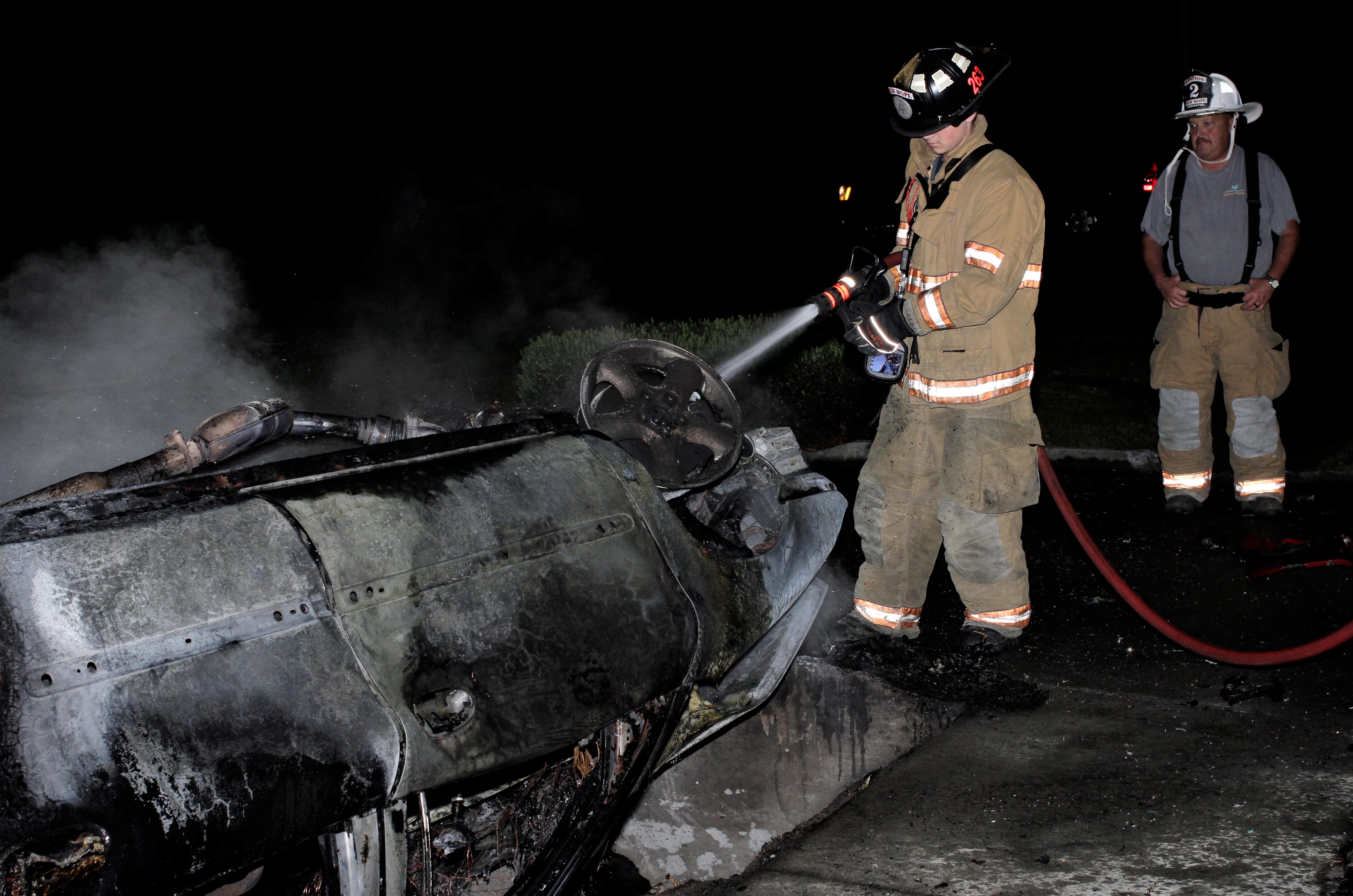 Driver Flees After Car Crashes Into Ditch (PHOTOS)