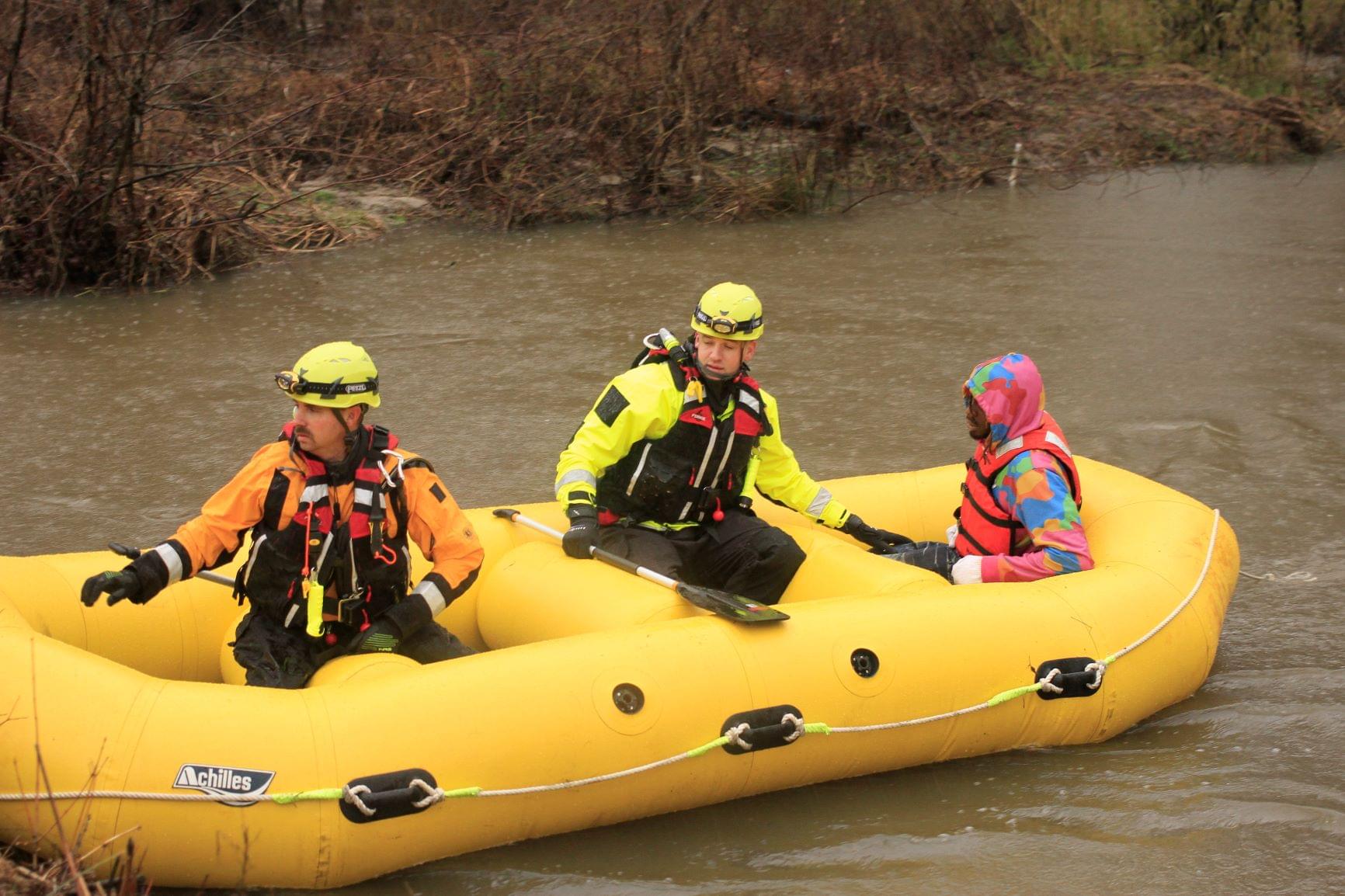 Driver Rescued After Vehicle Ends Up In Creek (PHOTO GALLERY)