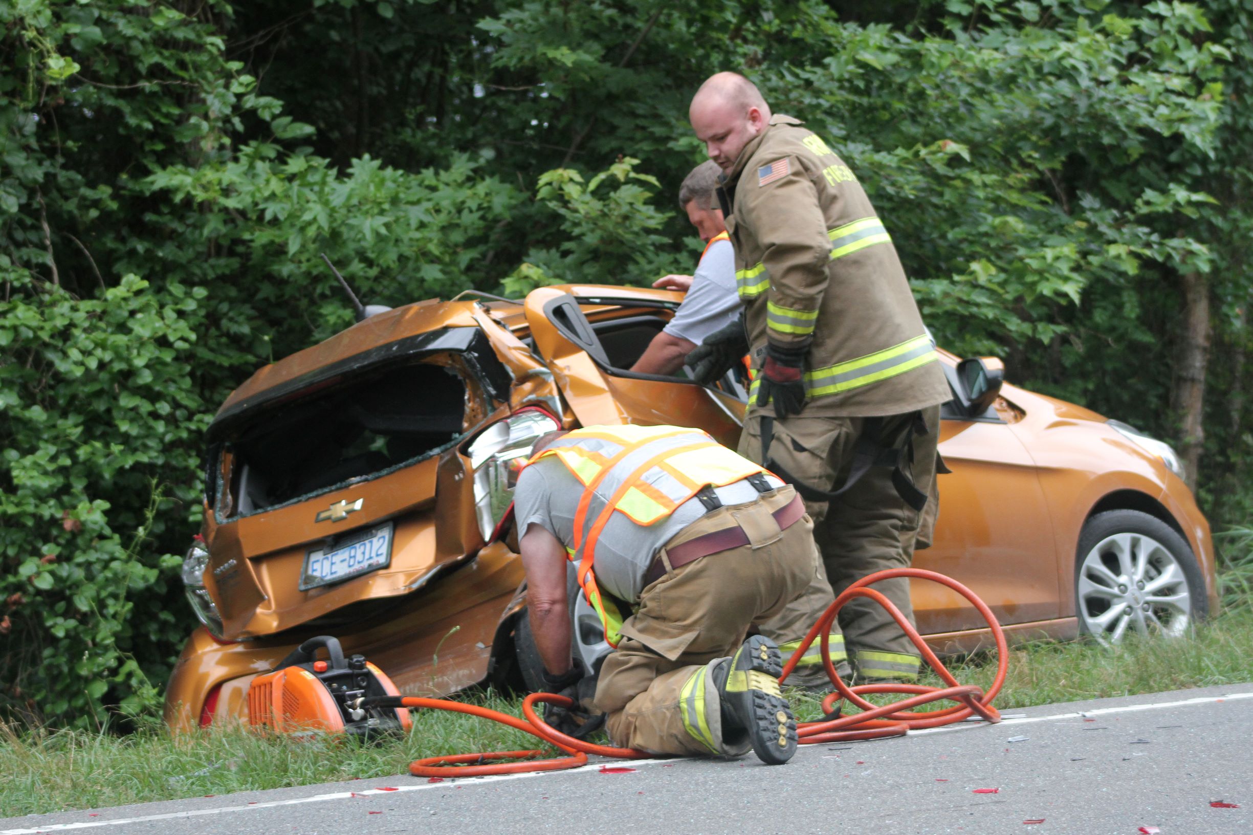 Occupants Freed After Vehicle Crash, Taken To Hospital (PHOTOS)