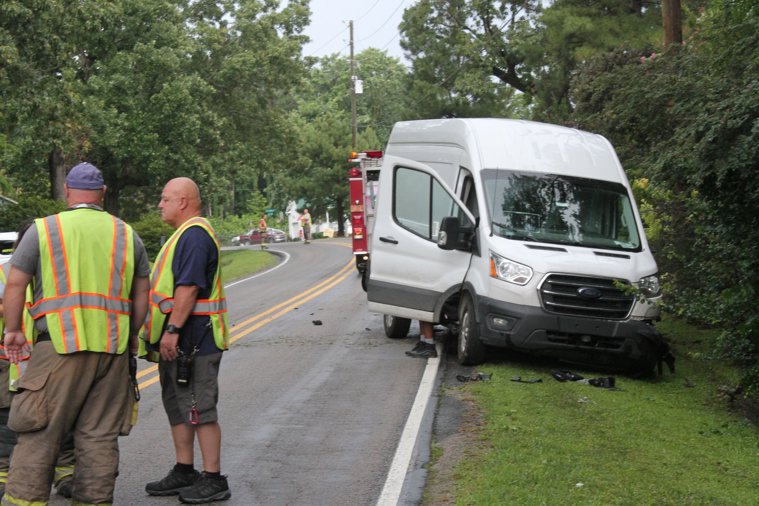 SUV Crashes Into Van Delivering Packages (PHOTOS)