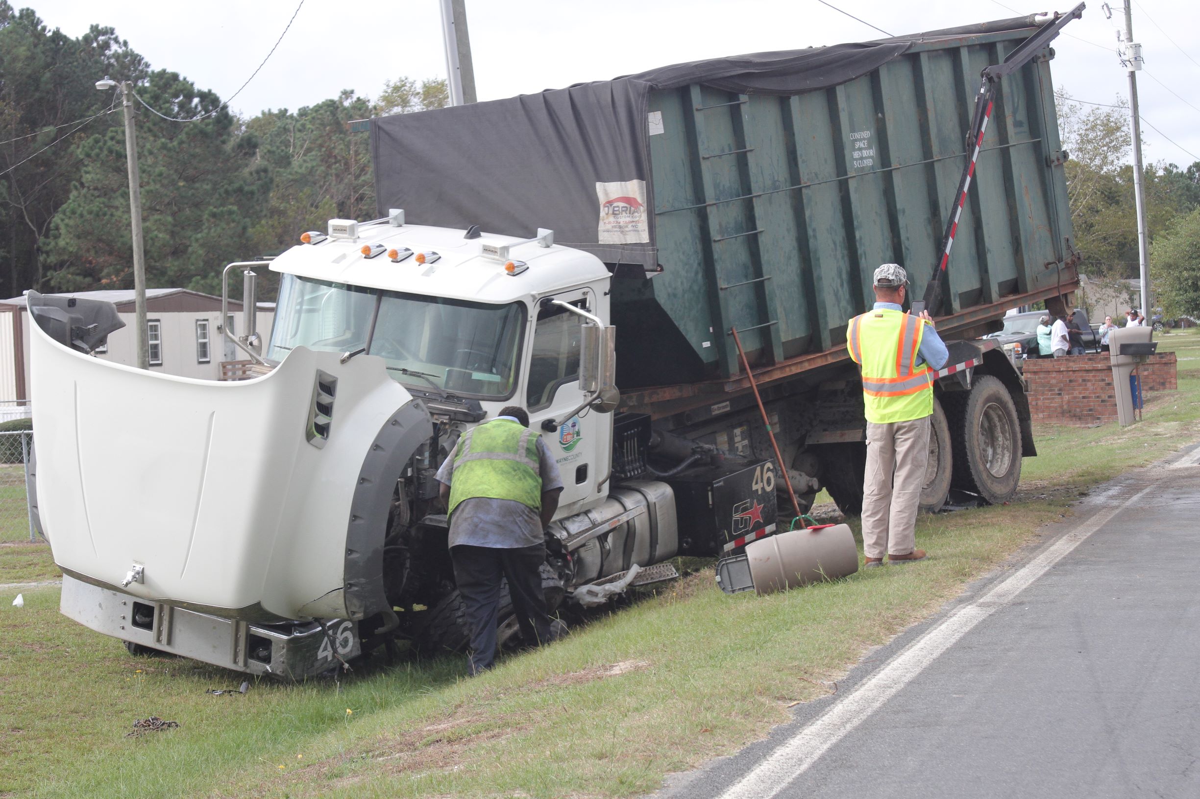 Car, Sanitation Truck Collide On Durham Lake Road (PHOTO GALLERY)