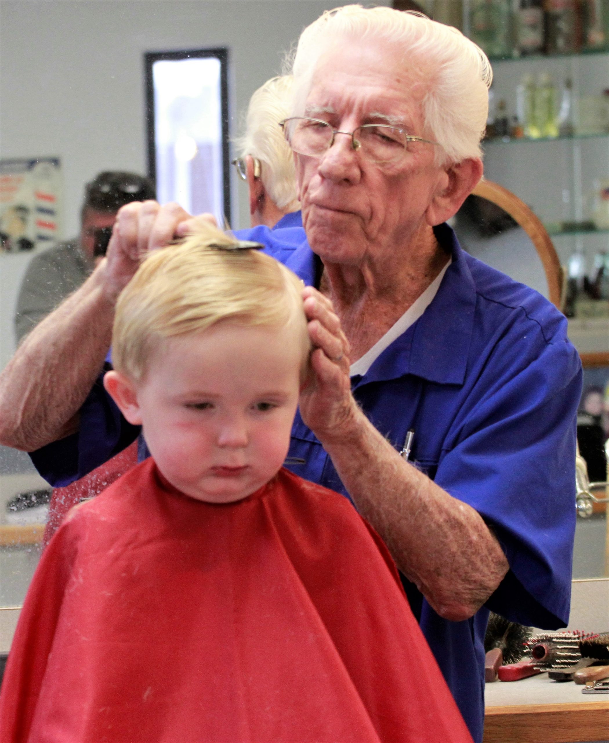 PIC OF THE DAY: A Haircut & A Lollipop