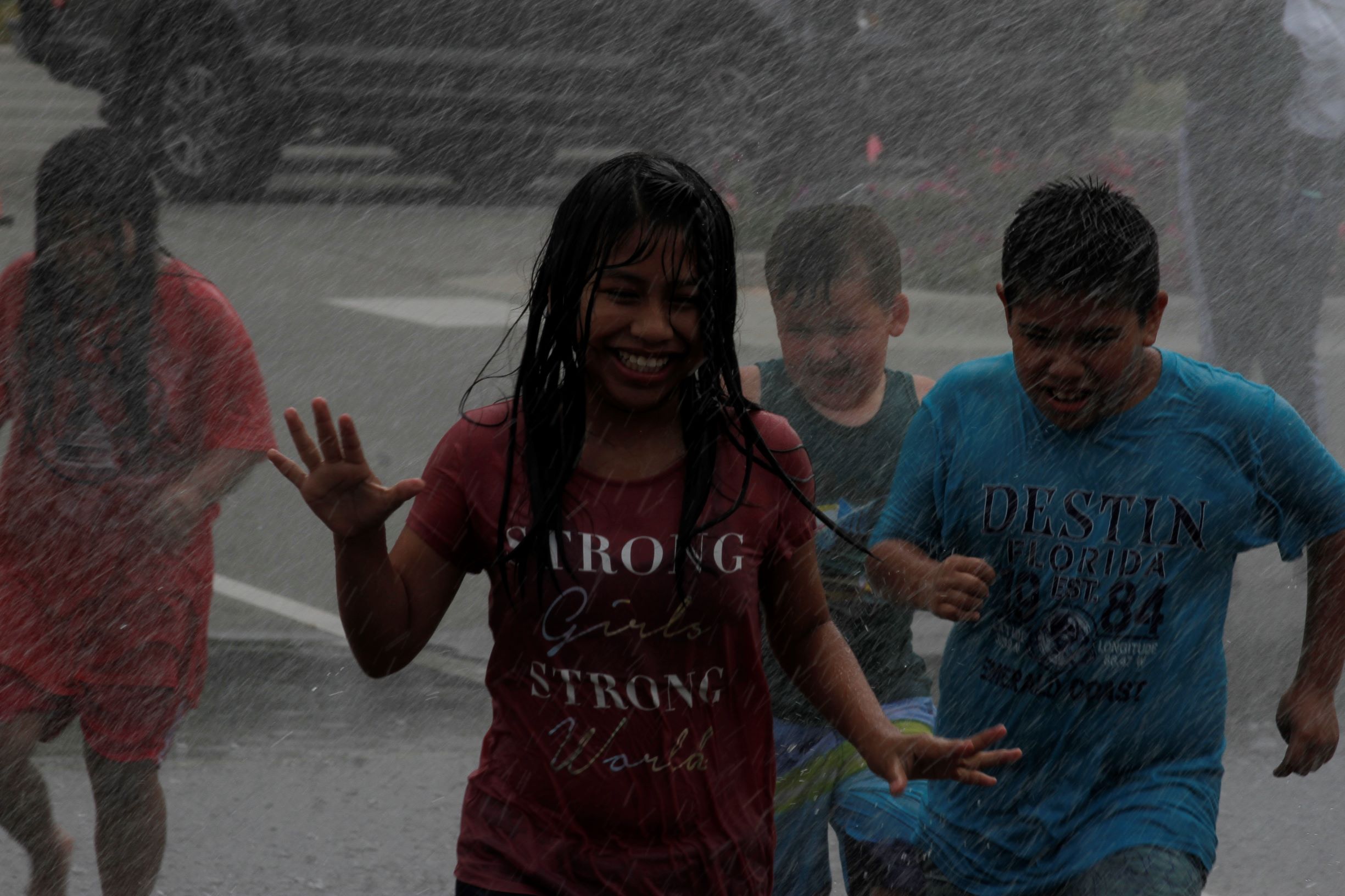 Sprinkler Fun Day Brings Relief From The Heat; Cooler Wetter Weather Ahead [Photo Gallery]