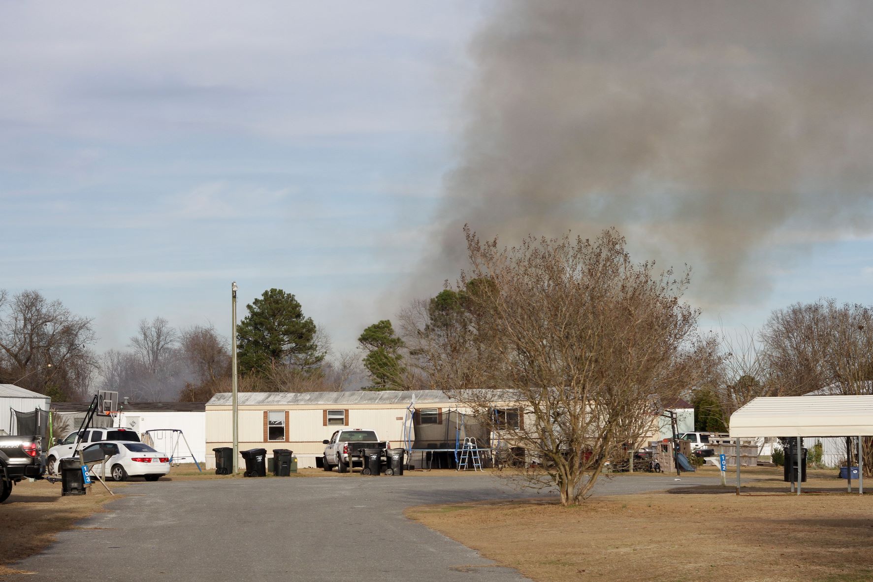 Backyard Fire Spreads Into Nearby Woods