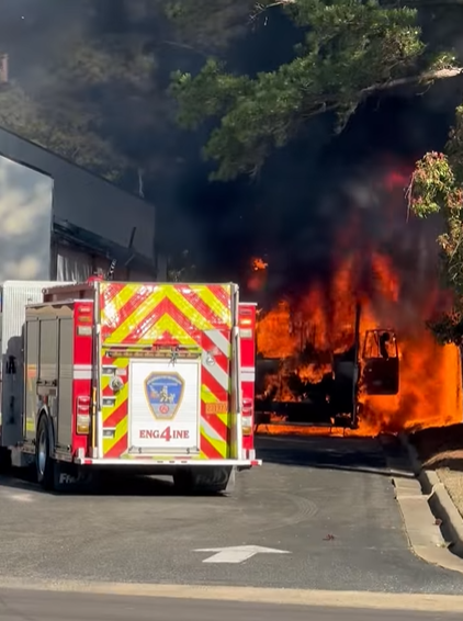 Fire in Sanitation Truck Damages Apartments and  Shopping Center