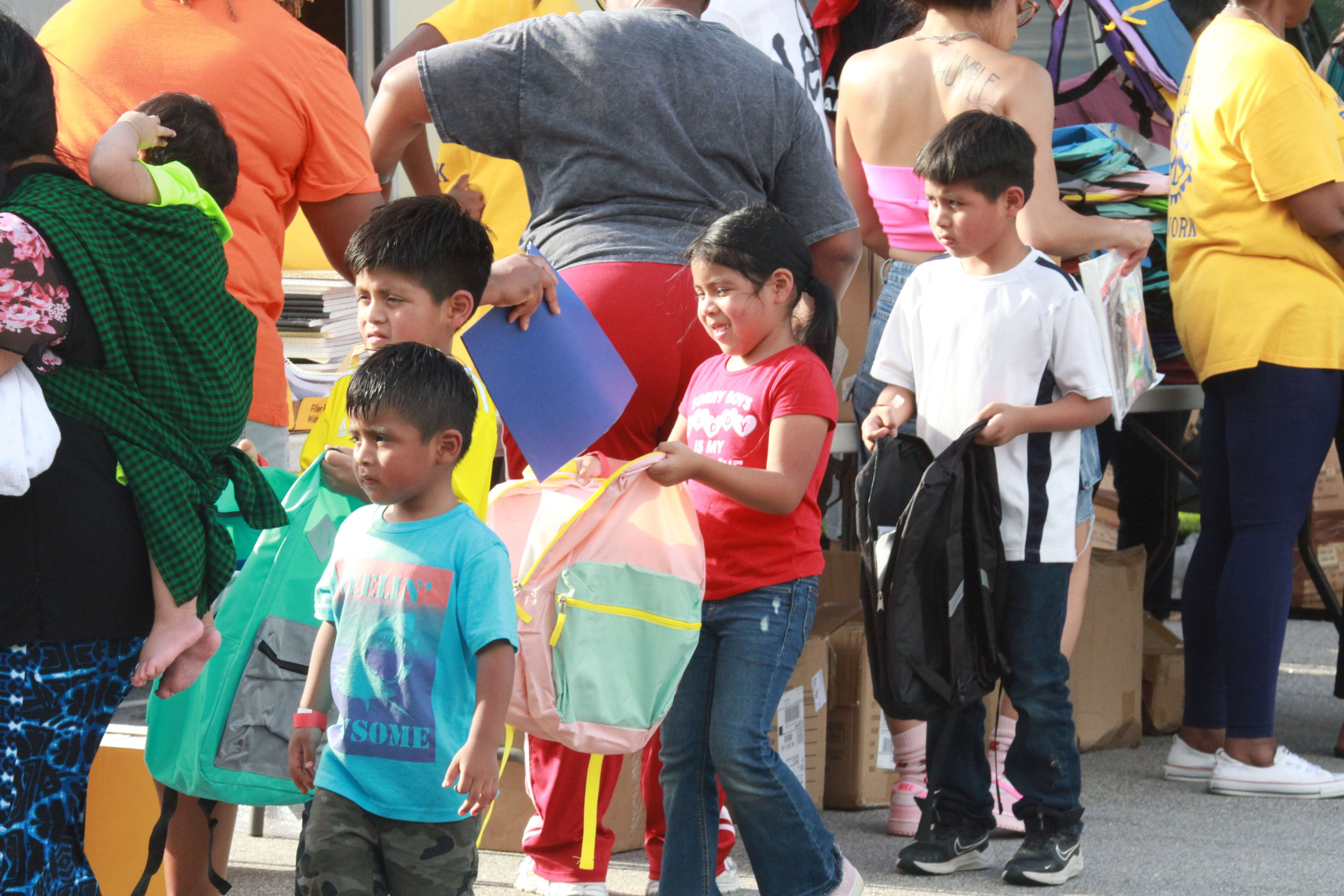 Community Organizations Unite for Annual Bookbag Giveaway in Mount Olive
