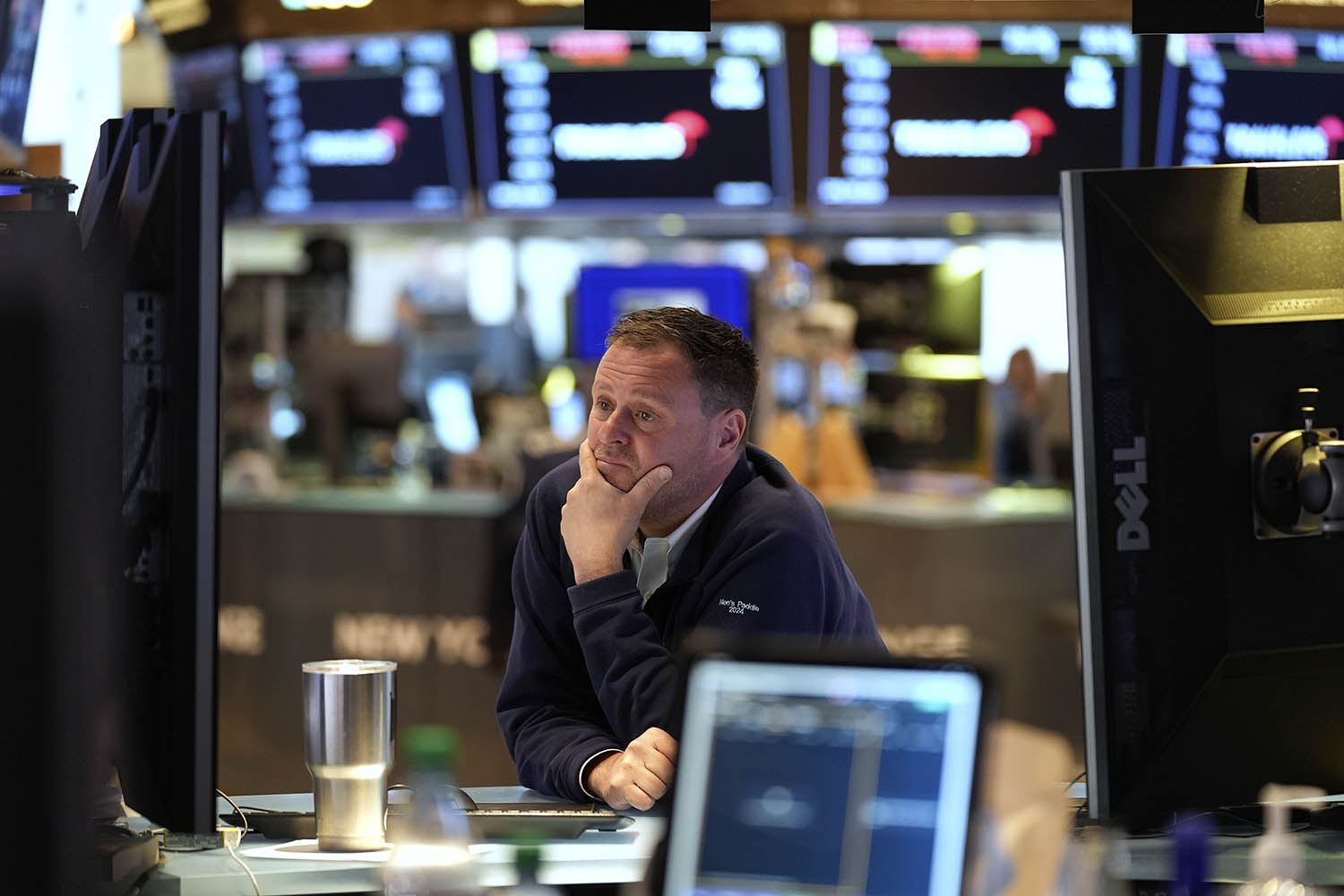 Wall Street holds near its record amid doubts about Trump’s tariffs