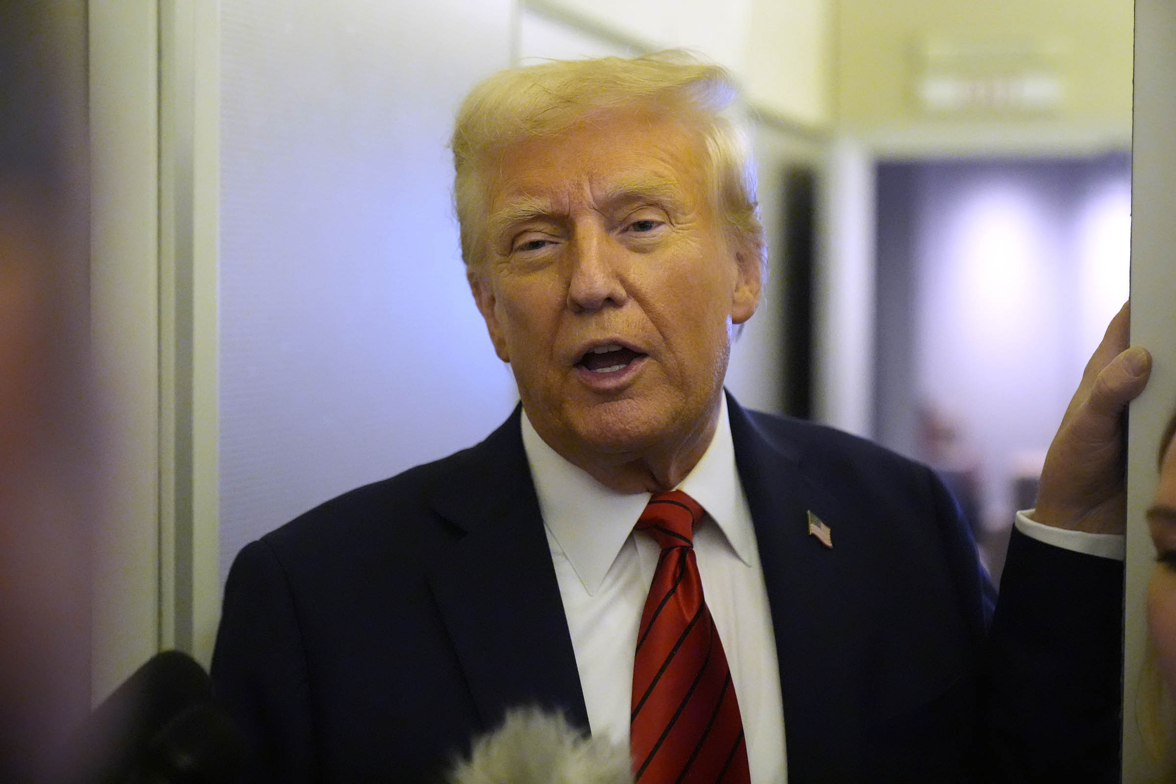 Appeals court throws out massive civil fraud penalty against President Donald Trump