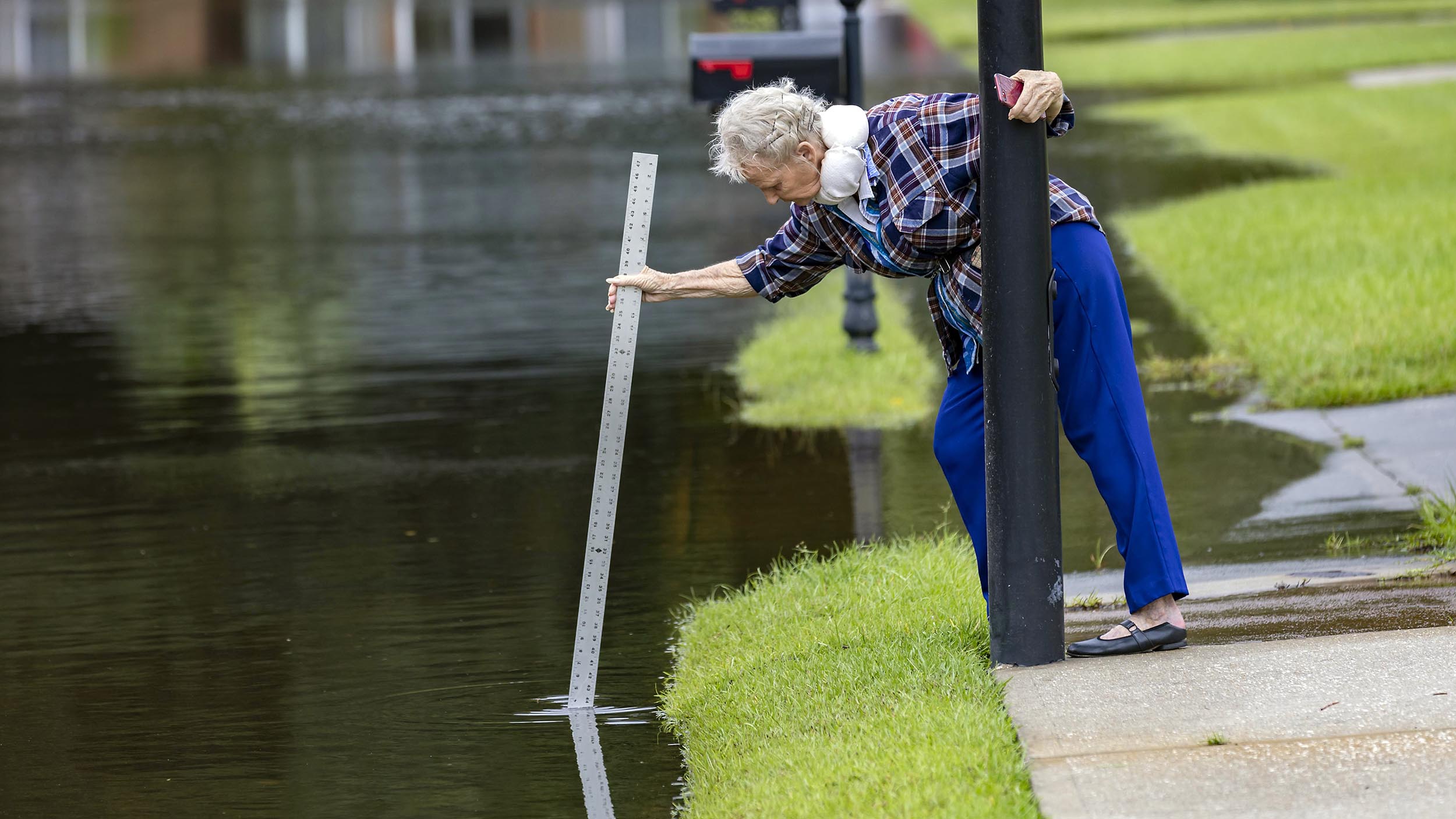 The Latest: A downgraded Debby still threatens with heavy rain and flooding