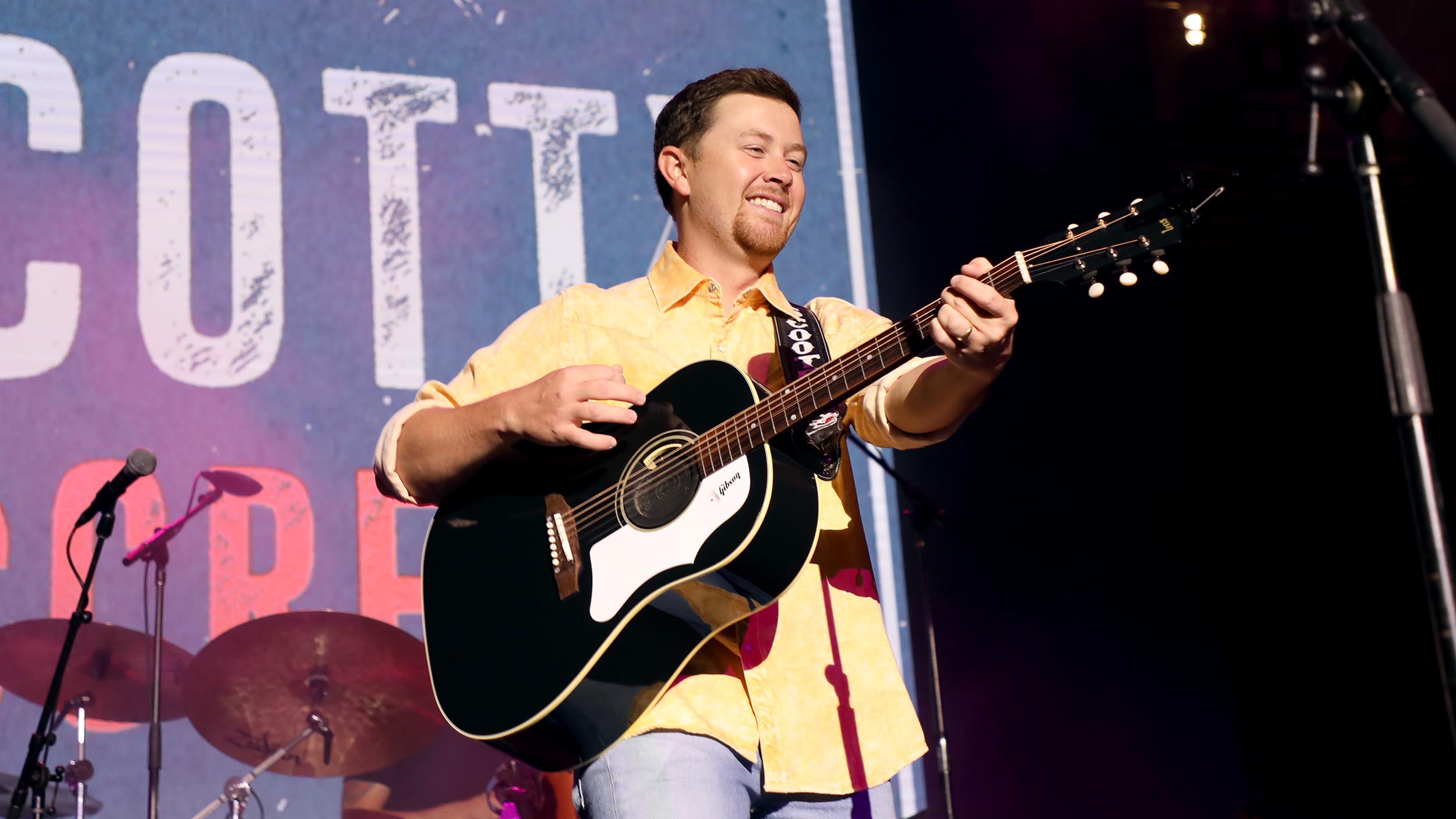 Criminal charges weighed against a man after Scotty McCreery stops show over an alleged assault