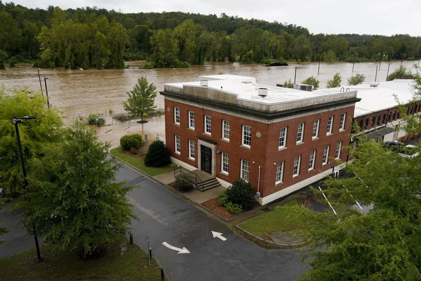 Torrential rains flood North Carolina mountains and create risk of dam failure