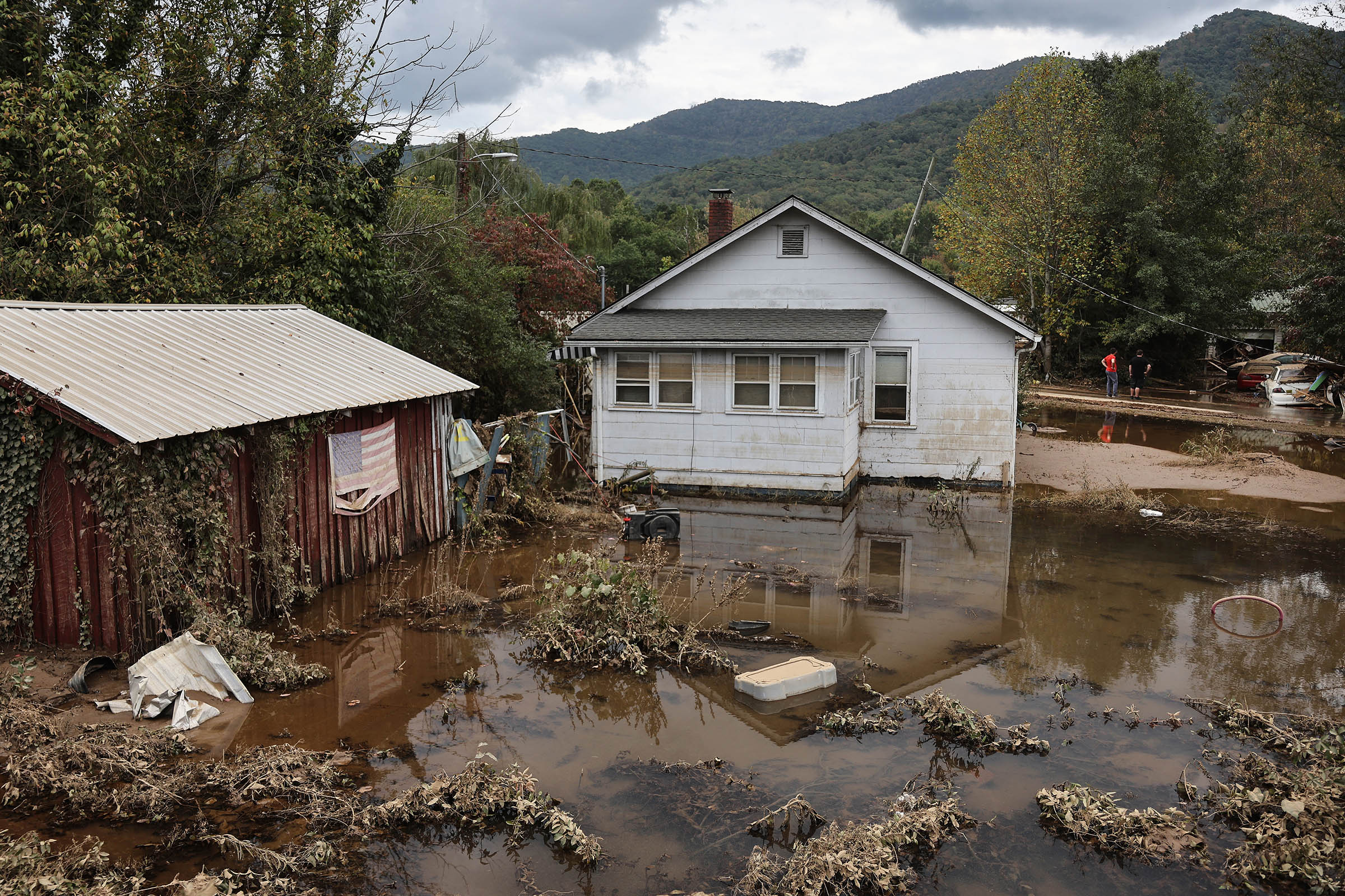 Death toll from Hurricane Helene rises to 227 as grim task of recovering bodies continues