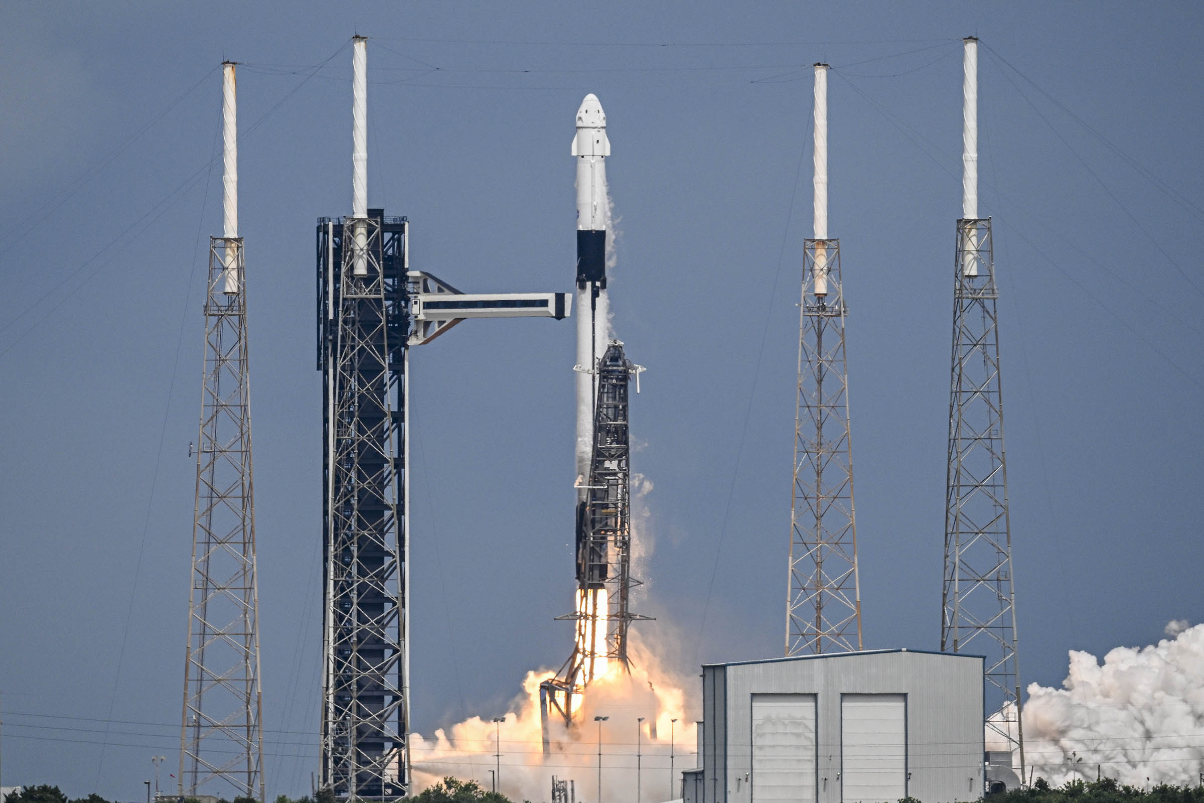 In an engineering feat, mechanical SpaceX arms catch Starship rocket booster back at the launch pad