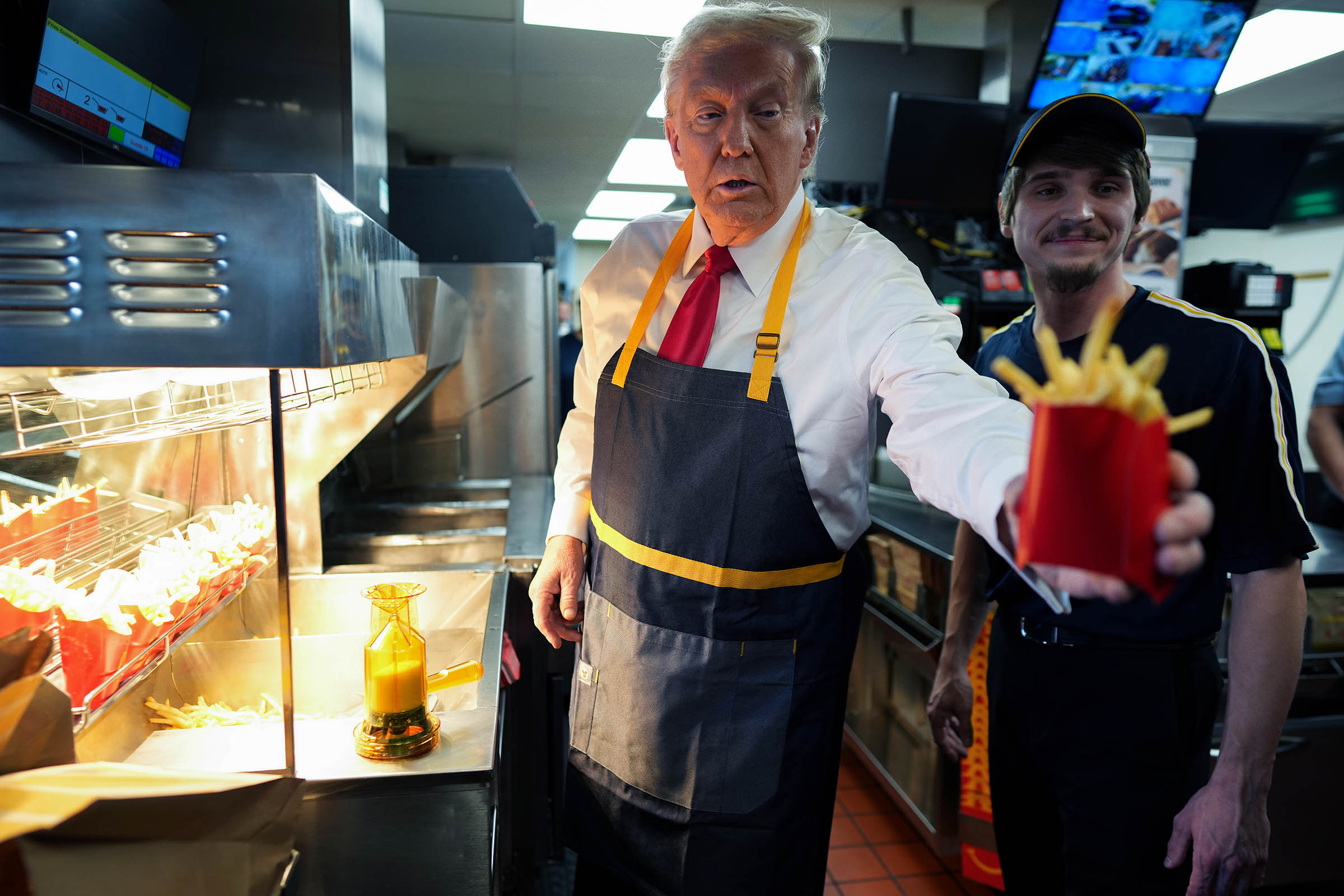 Trump works the fry station and holds a drive-thru news conference at a Pennsylvania McDonald’s