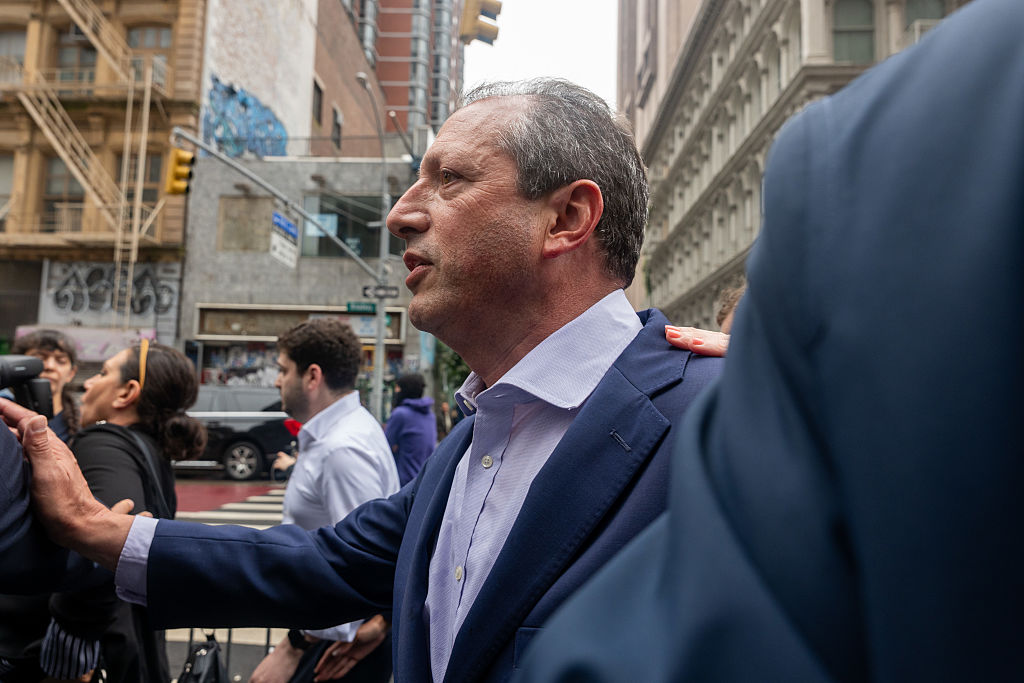 NYC mayoral candidate is arrested at immigration court after linking arms with man being detained