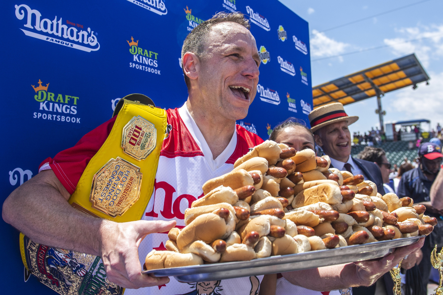 Joey ‘Jaws’ Chestnut reclaims title in Famous hot dog eating contest, wins 17th Mustard Belt