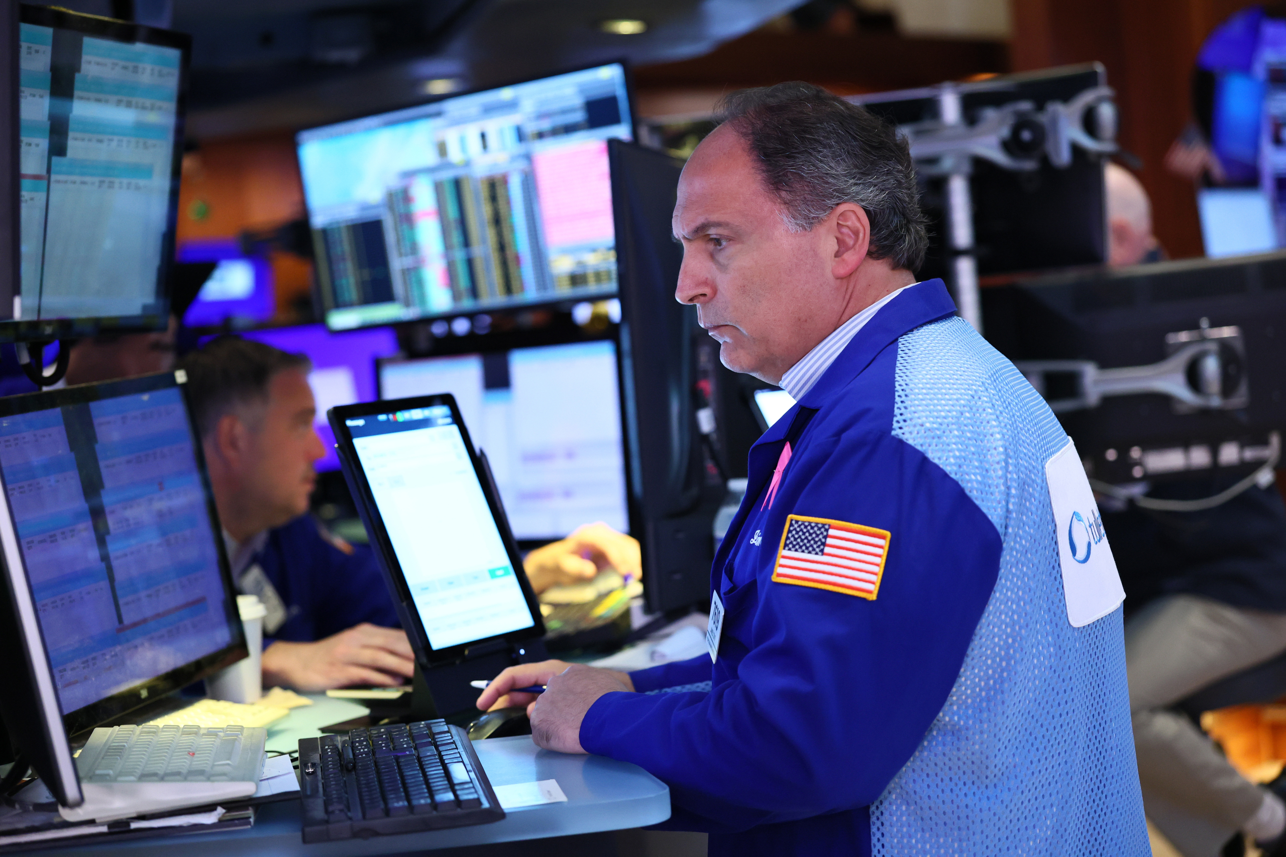 S&P 500 and Nasdaq composite pull back from their all-time highs