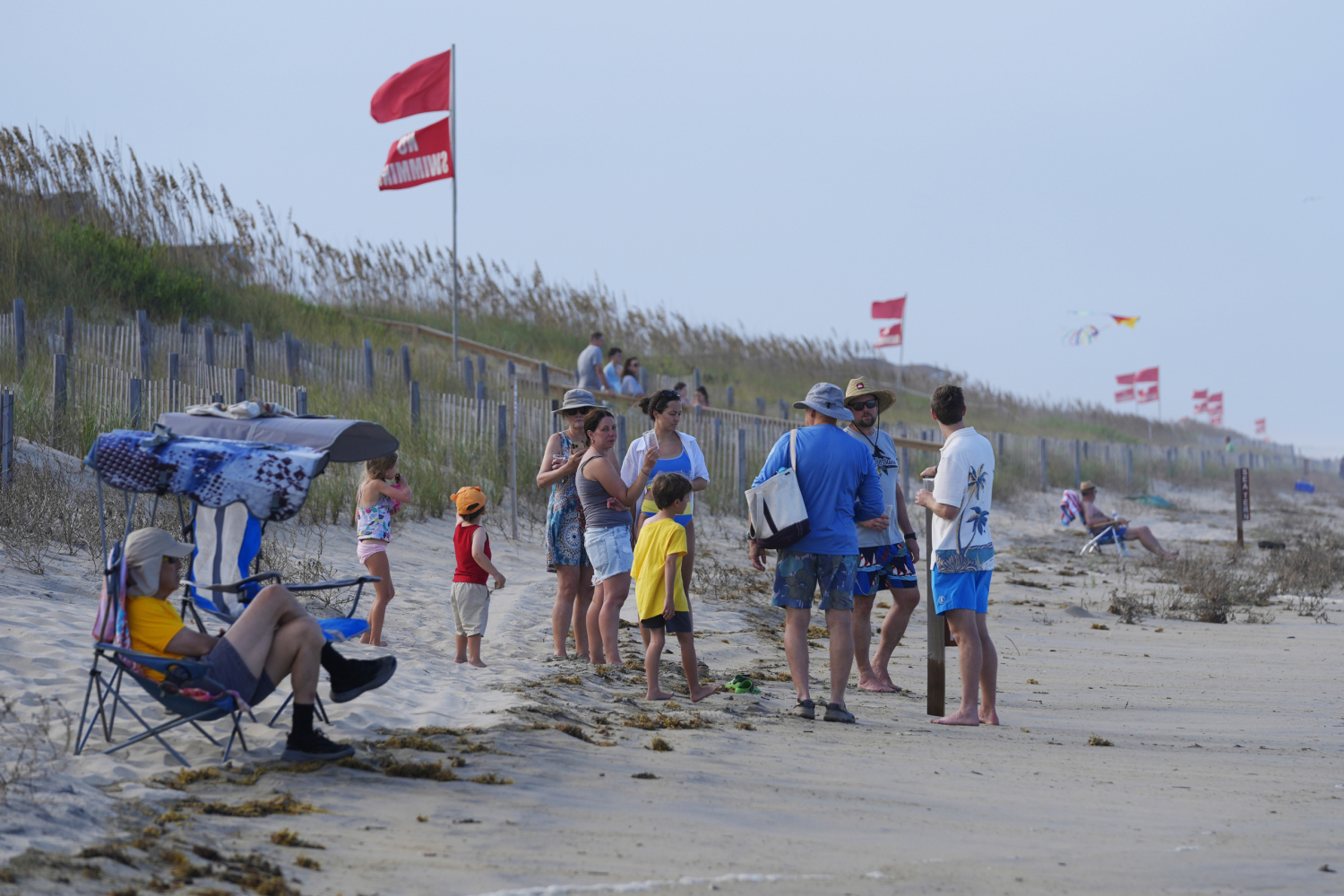 Summer celebrations meet closed beaches and warnings on US East Coast due to Hurricane Erin