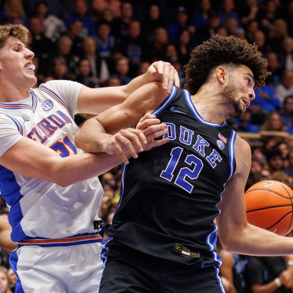 Evans’ late 3 helps No. 4 Duke top No. 15 Florida 67-66 in ACC/SEC Challenge