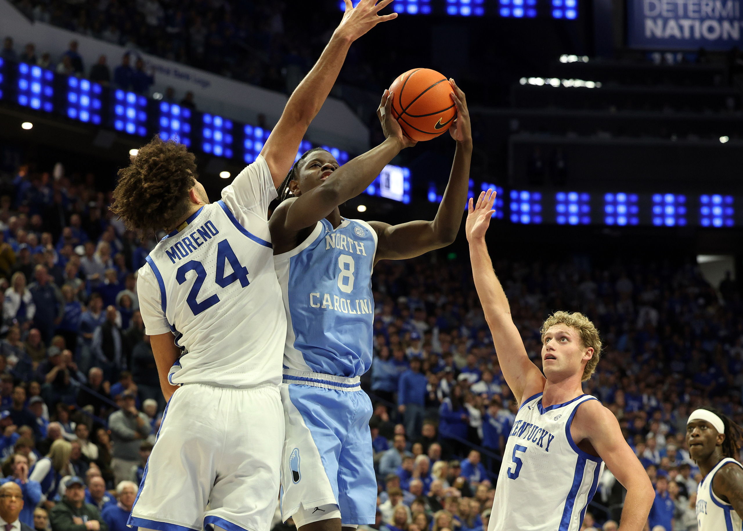 Dixon delivers late as No. 16 North Carolina wins 67-64 at No. 18 Kentucky