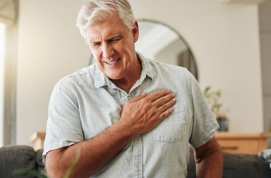 An older man having a heart attack