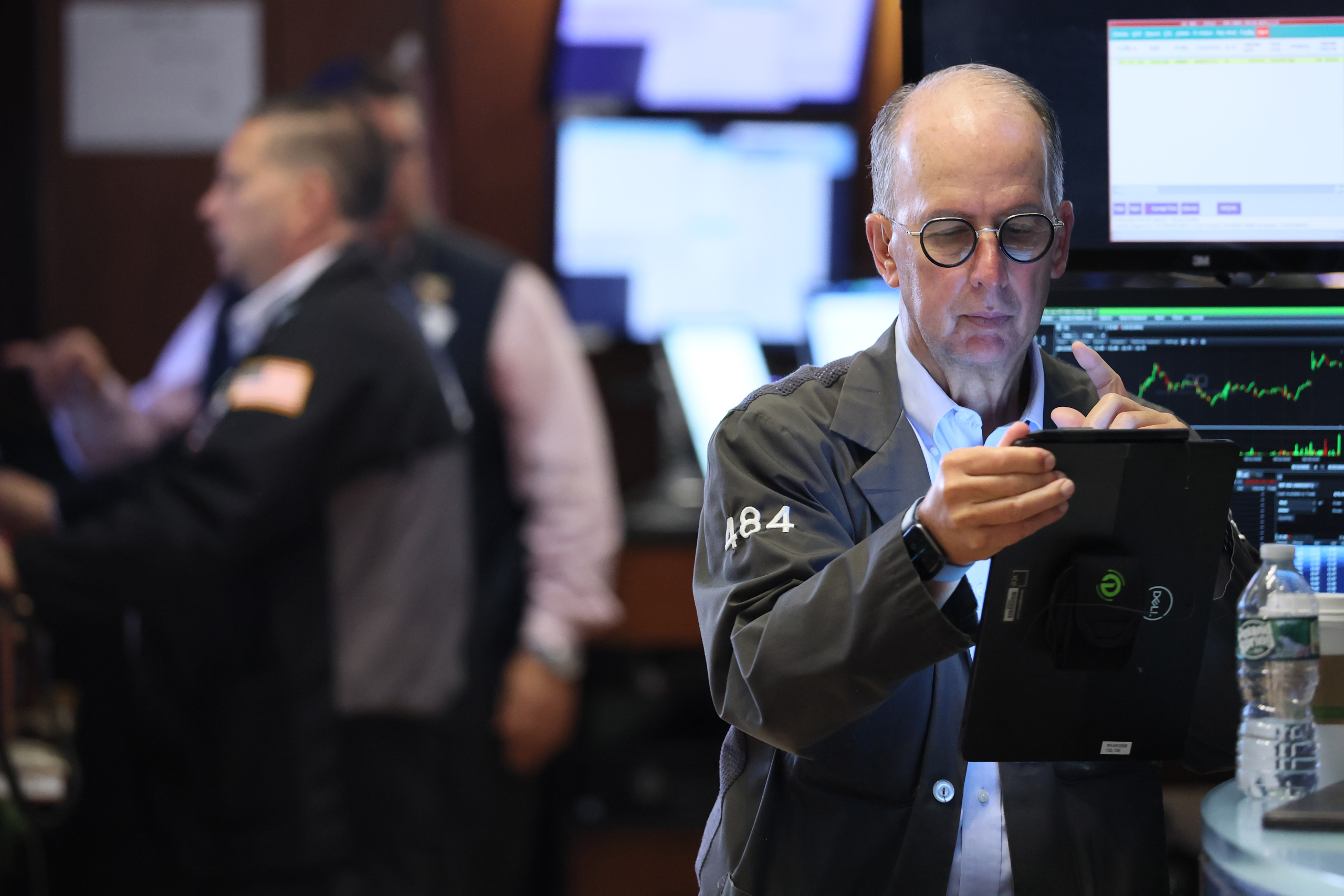 A late push sends Wall Street near its records
