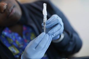 FDA approves updated COVID-19 shots but limits access for some kids and adults
