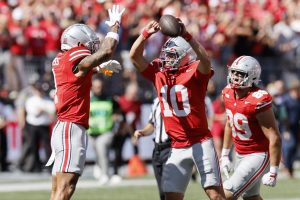 Sayin, defense propel No. 3 Ohio State past top-ranked Texas 14-7