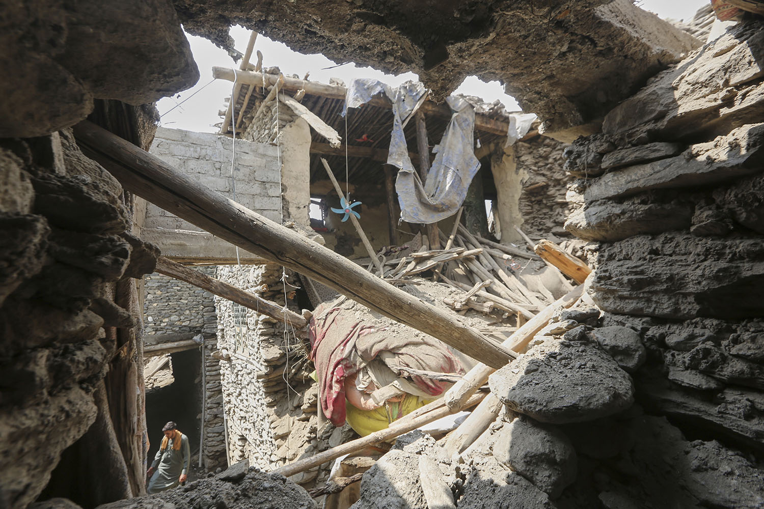 Rescuers race to find Afghan quake survivors as death toll passes 1,400