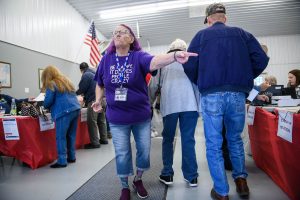 Justice Department’s early moves on voting and elections signal a shift from its traditional role