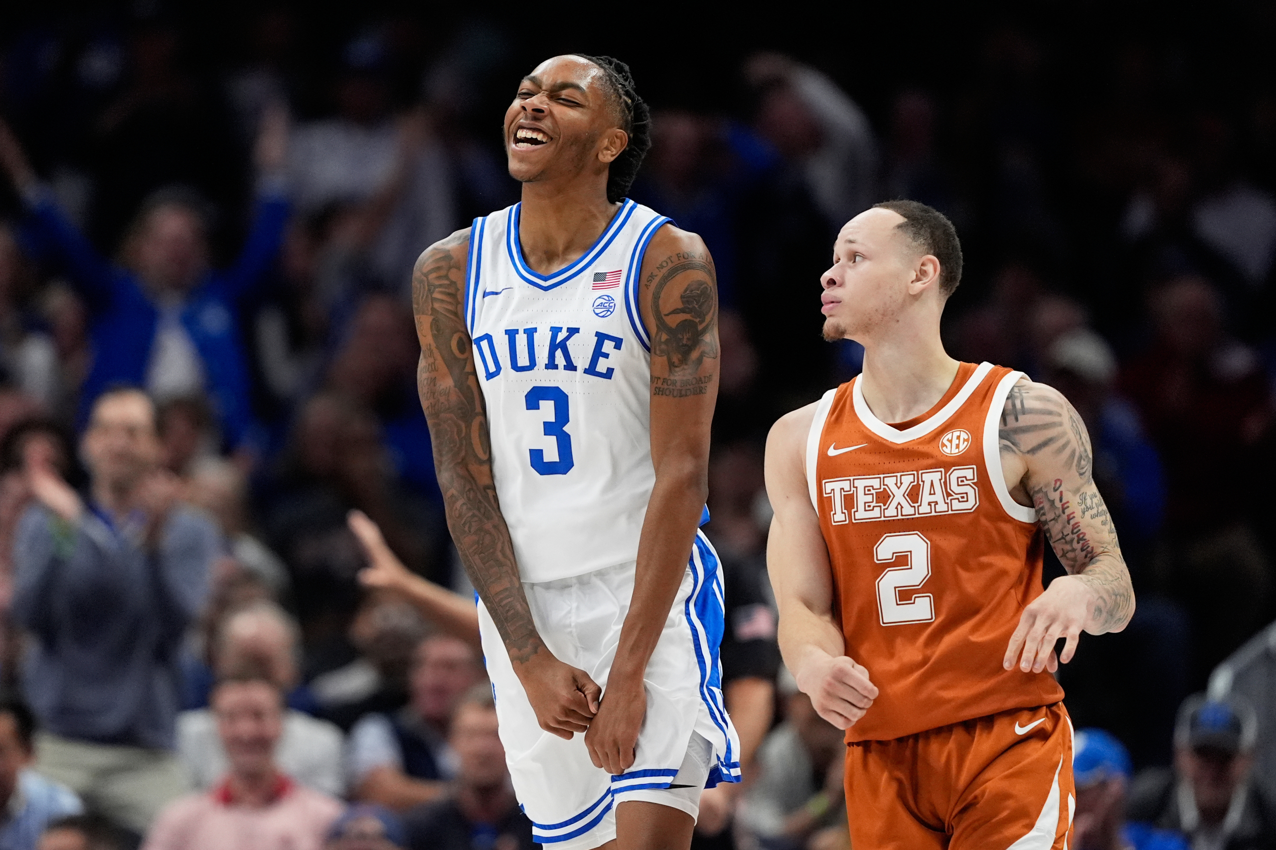Evans, Boozer help No. 6 Duke overcome slow start and defeat Texas 75-60 in season opener