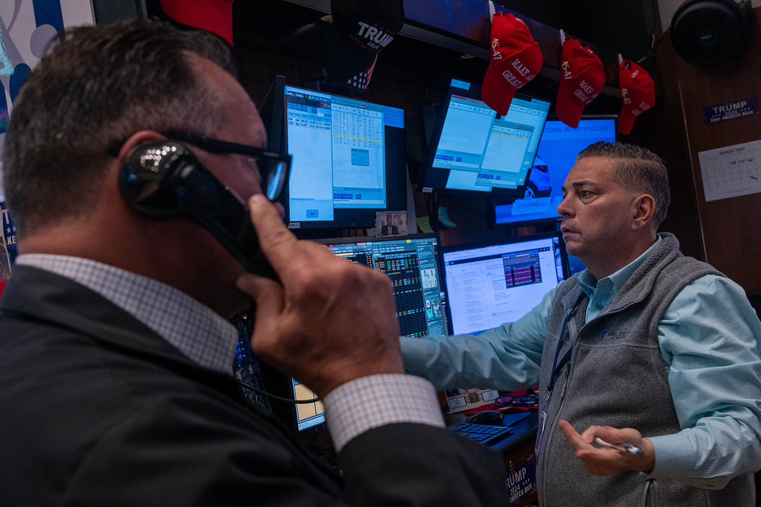 Wall Street steadies after Nvidia, Palantir and other AI stars trim their losses