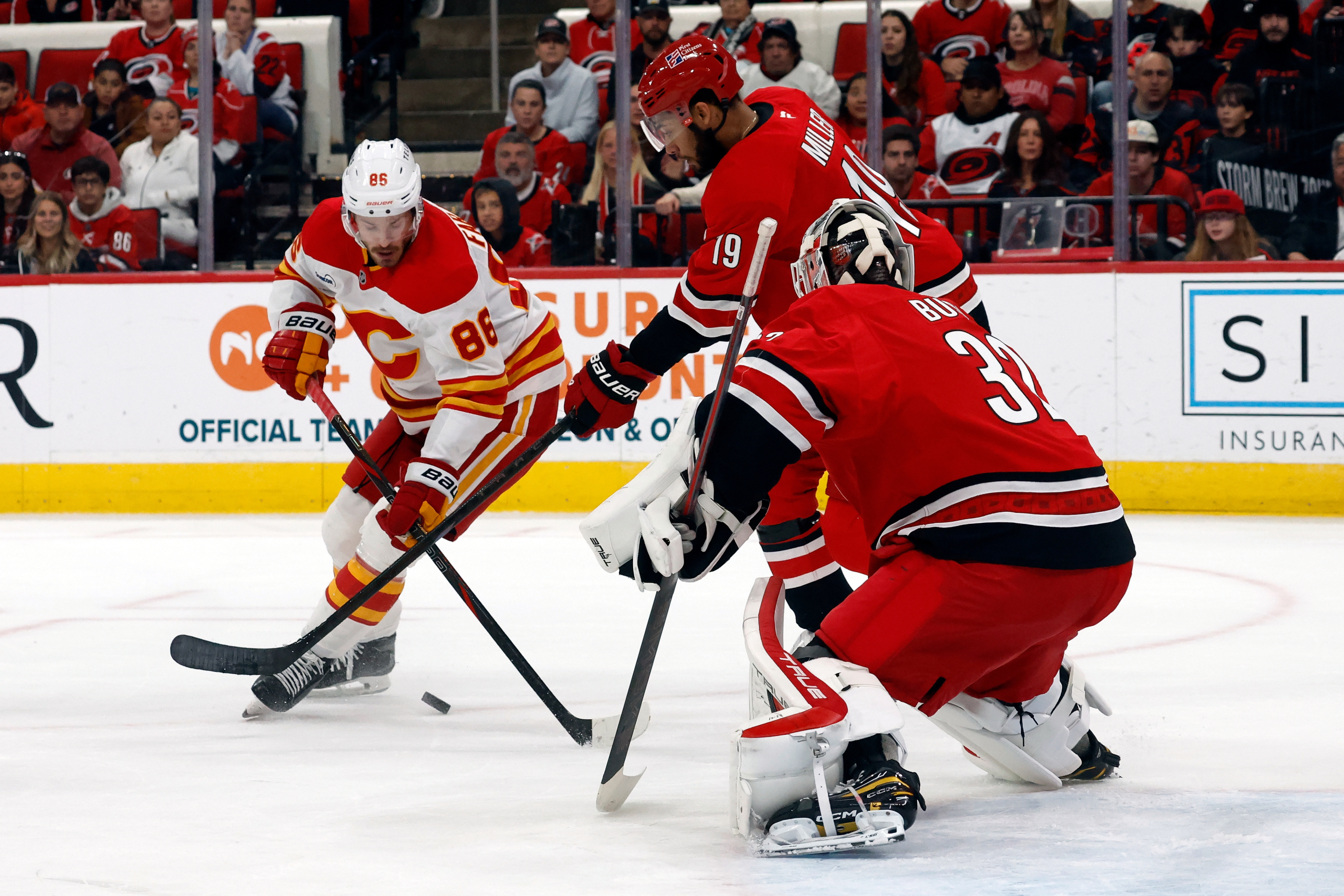 Bussi makes 15 saves for 1st NHL shutout, Ehlers scores in OT in Hurricanes’ 1-0 win over Flames