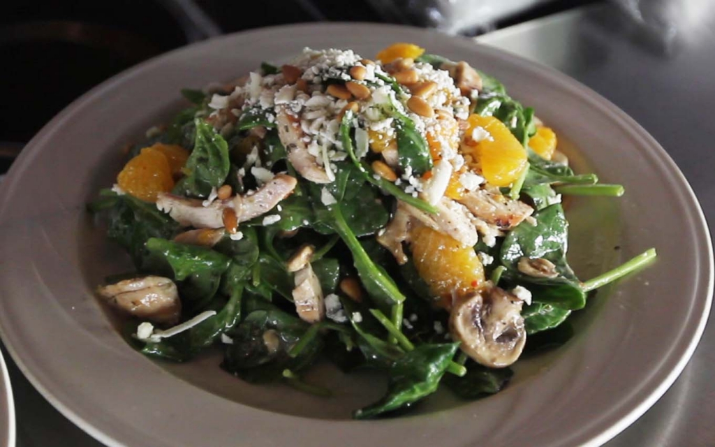 The spinach salad features chicken and mandarin oranges, and Richard Beene described it as one of his most favorite dishes he sampled during his visit to the downtown Bakersfield restaurant. Fresh Spinach with julienne of grilled chicken, sliced mushrooms, mandarin oranges, pine nuts - tossed in a vinaigrette dressing, topped with gorgonzola cheese.