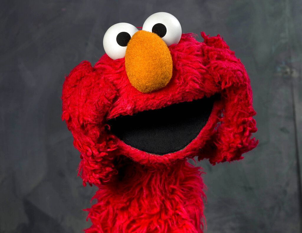Elmo gets vaccine to set example for kids